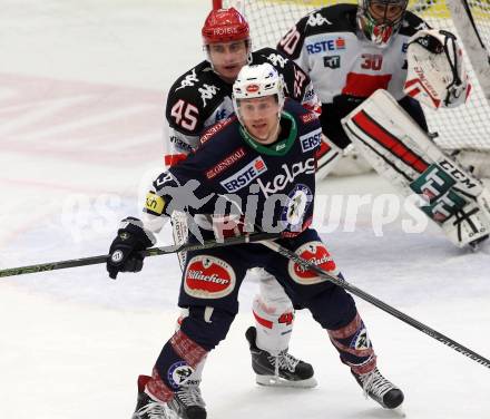 EBEL. Eishockey Bundesliga. EC VSV gegen HC TWK Innsbruck.	 .  Dustin Johner (VSV), SCHULLER David (Innsbruck). Villach, am 29.11.2015.
Foto: Kuess 


---
pressefotos, pressefotografie, kuess, qs, qspictures, sport, bild, bilder, bilddatenbank