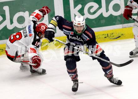 EBEL. Eishockey Bundesliga. EC VSV gegen HC TWK Innsbruck.	 .  Miha Verlic (VSV), SPURGEON Tyler (Innsbruck). Villach, am 29.11.2015.
Foto: Kuess 


---
pressefotos, pressefotografie, kuess, qs, qspictures, sport, bild, bilder, bilddatenbank