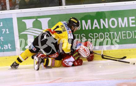 EBEL. Eishockey Bundesliga. KAC gegen 	UPC Vienna Capitals. Stefan Geier,  (KAC), Patrick Peter (Caps). Klagenfurt, am 13.12.2015.
Foto: Kuess

---
pressefotos, pressefotografie, kuess, qs, qspictures, sport, bild, bilder, bilddatenbank