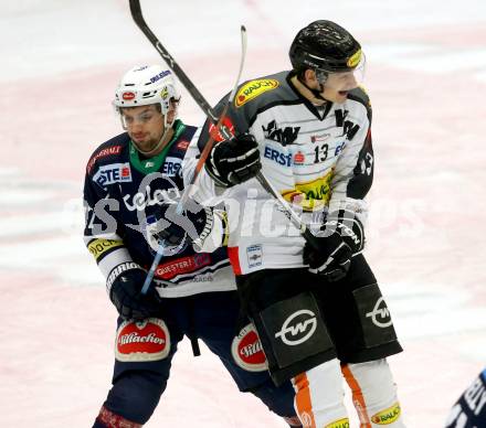 EBEL. Eishockey Bundesliga. EC VSV gegen Dornbirner Eishockey Club. Florian Muehlstein, (VSV), Oliver Achermann (Dornbirn). Villach, am 30.12.2015.
Foto: Kuess 


---
pressefotos, pressefotografie, kuess, qs, qspictures, sport, bild, bilder, bilddatenbank