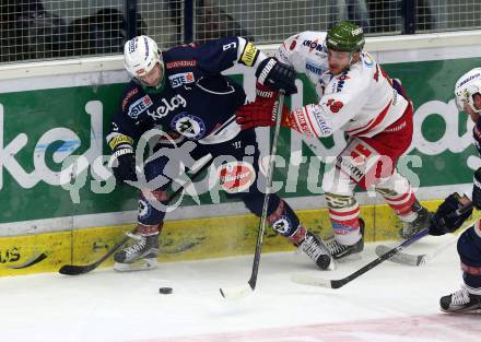 EBEL. Eishockey Bundesliga. EC VSV gegen HCB Suedtirol. Dustin Johner,  (VSV), Nathan Dicasmirro (Bozen). Villach, am 1.1.2016.
Foto: Kuess 


---
pressefotos, pressefotografie, kuess, qs, qspictures, sport, bild, bilder, bilddatenbank