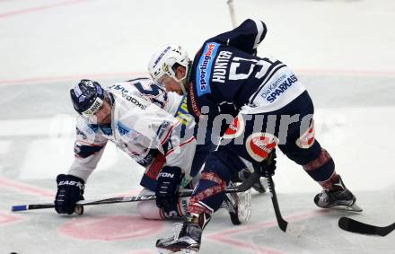 EBEL. Eishockey Bundesliga. EC VSV gegen Fehervar AV 19. Eric Hunter,  (VSV), Andrew Sarauer (Alba Volan). Villach, am 3.1.2016.
Foto: Kuess 


---
pressefotos, pressefotografie, kuess, qs, qspictures, sport, bild, bilder, bilddatenbank