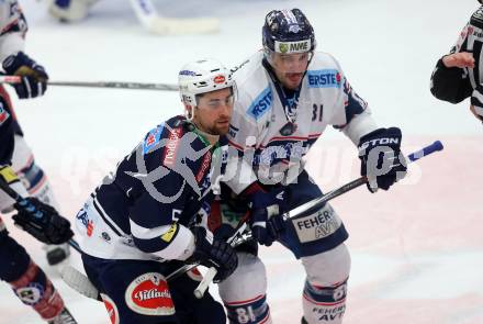 EBEL. Eishockey Bundesliga. EC VSV gegen Fehervar AV 19. Eric Hunter,  (VSV), Ladislav Sikorcin (Alba Volan). Villach, am 3.1.2016.
Foto: Kuess 


---
pressefotos, pressefotografie, kuess, qs, qspictures, sport, bild, bilder, bilddatenbank