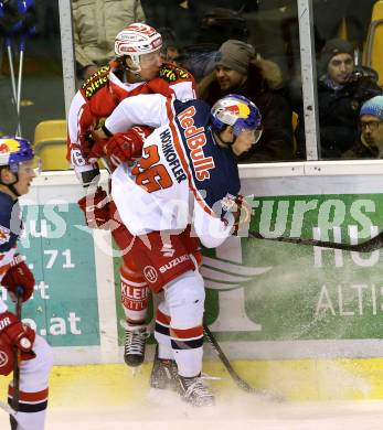 EBEL. Eishockey Bundesliga. KAC gegen EC Red Bull Salzburg. Patrick Harand,  (KAC), Peter Hochkofler (Salzburg). Klagenfurt, am 5.1.2016.
Foto: Kuess

---
pressefotos, pressefotografie, kuess, qs, qspictures, sport, bild, bilder, bilddatenbank