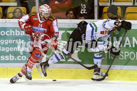 EBEL. Eishockey Bundesliga. KAC gegen HDD TELEMACH Olimpija Ljubljana. Steven Strong, (KAC), Gregor Koblar (Laibach). Klagenfurt, am 8.1.2016.
Foto: Kuess

---
pressefotos, pressefotografie, kuess, qs, qspictures, sport, bild, bilder, bilddatenbank