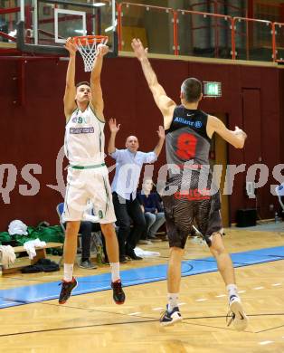 Basketball 2. Bundesliga 2015/16 Grunddurchgang 15. Runde. KOS Celovec  gegen Raiders Villach. Kalmanada Nenad (KOS), Ales Primc (Villach). Klagenfurt, 16.1.2016.
Foto: Kuess
---
pressefotos, pressefotografie, kuess, qs, qspictures, sport, bild, bilder, bilddatenbank