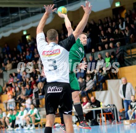 Handball Bundesliga. Schlafraum.at Kaernten gegen SC Ferlach. Rok Ivancic,  (HCK), Risto Arnaudovski (Ferlach). Viktring, am 16.1.2016.
Foto: Kuess
---
pressefotos, pressefotografie, kuess, qs, qspictures, sport, bild, bilder, bilddatenbank