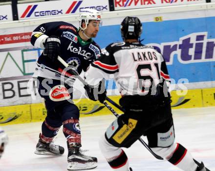 EBEL. Eishockey Bundesliga. EC VSV gegen HC Orli Znojmo. Eric Hunter,  (VSV), Andre Lakos (Znojmo). Villach, am 17.1.2016.
Foto: Kuess 


---
pressefotos, pressefotografie, kuess, qs, qspictures, sport, bild, bilder, bilddatenbank