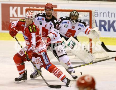 EBEL. Eishockey Bundesliga. KAC gegen 	HC TWK Innsbruck. Thomas HUndertpfund,  (KAC), Florian Pedevilla (Innsbruck). Klagenfurt, am 22.1.2016.
Foto: Kuess

---
pressefotos, pressefotografie, kuess, qs, qspictures, sport, bild, bilder, bilddatenbank