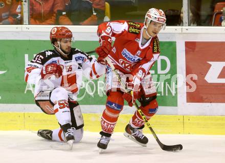 EBEL. Eishockey Bundesliga. KAC gegen 	HC TWK Innsbruck. Oliver Setzinger, (KAC), Nicholas Schaus (Innsbruck). Klagenfurt, am 22.1.2016.
Foto: Kuess

---
pressefotos, pressefotografie, kuess, qs, qspictures, sport, bild, bilder, bilddatenbank