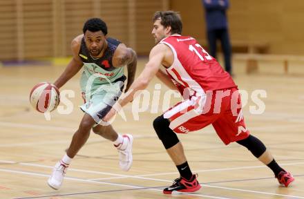 Basketball 2. Bundesliga 2015/16 Grunddurchgang 16. Runde. Villach Raiders  gegen St. Poelten Dragons. Dominique Richmond Jackson  (Villach), Lukas Boeck (St. Poelten). Villach, 24.1.2016.
Foto: Kuess
---
pressefotos, pressefotografie, kuess, qs, qspictures, sport, bild, bilder, bilddatenbank