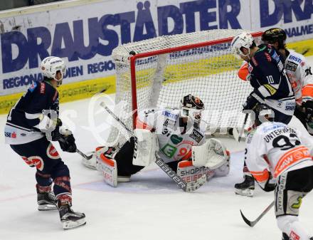 EBEL. Eishockey Bundesliga. EC VSV gegen Moser Medical Graz99ers. Eric Hunter, Brock McBride,  (VSV), Sebastian Dahm (Graz). Villach, am 29.1.2016.
Foto: Kuess 


---
pressefotos, pressefotografie, kuess, qs, qspictures, sport, bild, bilder, bilddatenbank