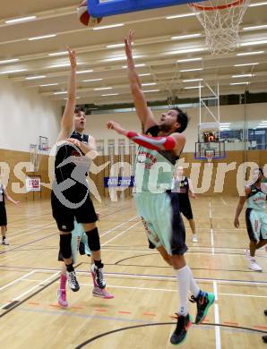 Basketball 2. Bundesliga 2015/16 Grunddurchgang 17. Runde. Villach Raiders  gegen Woerthersee Piraten. Marko Kolaric, (Villach), Christof Gspandl  (Piraten). Villach, 7.2.2016.
Foto: Kuess
---
pressefotos, pressefotografie, kuess, qs, qspictures, sport, bild, bilder, bilddatenbank