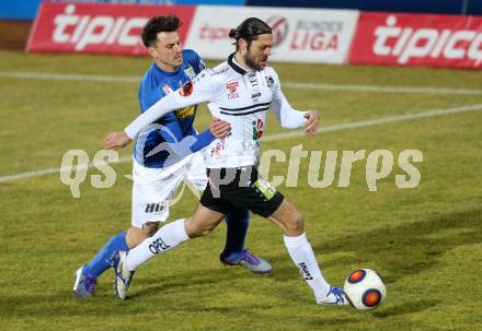 Fussball tipico Bundesliga. RZ Pellets WAC gegen SV Groedig. Nemanja Rnic,  (WAC), Robert Strobl (Groedig). Lavanttal Arena, am 20.2.2016.
Foto: Kuess
---
pressefotos, pressefotografie, kuess, qs, qspictures, sport, bild, bilder, bilddatenbank