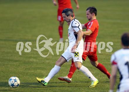 Fussball Kaerntner Liga. Voelkermarkt gegen ATUS Ferlach. Thomas Riedl,  (Voelkermarkt), Martin Trattnig (Ferlach). Voelkermarkt, am 1.4.2016.
Foto: Kuess
---
pressefotos, pressefotografie, kuess, qs, qspictures, sport, bild, bilder, bilddatenbank