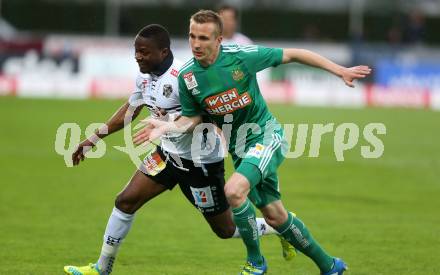 Fussball tipico Bundesliga. RZ Pellets WAC gegen SK Rapid Wien. Issiaka Ouedraogo,  (WAC), Christopher Dibon (Wien). Lavanttal Arena Wolfsberg, am 9.4.2016.
Foto: Kuess
---
pressefotos, pressefotografie, kuess, qs, qspictures, sport, bild, bilder, bilddatenbank