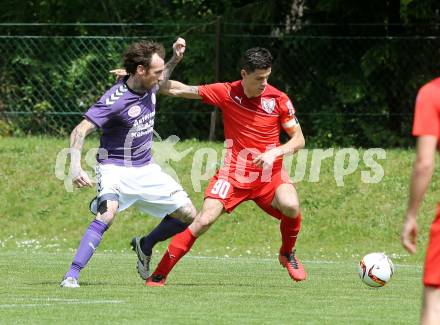 Fussball Kaerntner Liga. ATUS Ferlach gegen Globasnitz. Lukas Jaklitsch, (Ferlach), Rok Pavlicic (Globasnitz). Ferlach, am 7.5.2016.
Foto: Kuess
---
pressefotos, pressefotografie, kuess, qs, qspictures, sport, bild, bilder, bilddatenbank