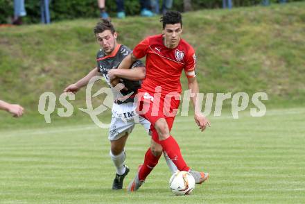 Fussball Kaerntner Liga. ATUS Ferlach gegen Feldkirchen. Lukas Jaklitsch,  (Ferlach), Michael Spitzer (Feldkirchen). Ferlach, am 4.6.2016.
Foto: Kuess
---
pressefotos, pressefotografie, kuess, qs, qspictures, sport, bild, bilder, bilddatenbank