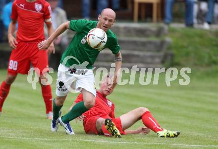 Fussball OEFB Cup. 1. Runde. ATUS Ferlach gegen Austria Lustenau. Erwin Bajric, (Ferlach),  Mario Bolter  (Lustenau). Ferlach, am 16.7.2016.
Foto: Kuess
---
pressefotos, pressefotografie, kuess, qs, qspictures, sport, bild, bilder, bilddatenbank