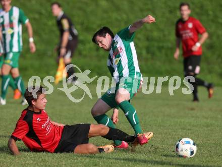 Fussball Kaerntner Liga. Maria Saal gegen Rapid Lienz. Johannes Georg Zebedin,  (Maria Saal), Christopher Korber (Lienz). Maria Saal, am 10.9.2016.
Foto: Kuess
---
pressefotos, pressefotografie, kuess, qs, qspictures, sport, bild, bilder, bilddatenbank