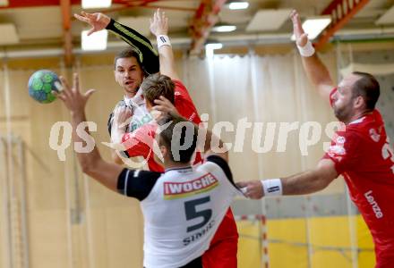 Handball HLA. SC Ferlach gegen HC Hard. Nemanja Malovic, Mario Simic, (Ferlach), Daniel Dicker, Domagoj Surac (Hard). Ferlach, am 27.9.2016.
Foto: Kuess
---
pressefotos, pressefotografie, kuess, qs, qspictures, sport, bild, bilder, bilddatenbank