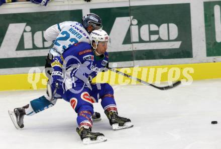 EBEL. Eishockey Bundesliga.  VSV gegen EHC Liwest Black Wings Linz. Eric Hunter,  (VSV), Fabio Hofer (Linz). Villach, am 4.10.2016.
Foto: Kuess 
---
pressefotos, pressefotografie, kuess, qs, qspictures, sport, bild, bilder, bilddatenbank