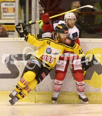 EBEL. Eishockey Bundesliga. KAC gegen 	UPC Vienna Capitals. Johannes Bischofberger, (KAC), Jamie Fraser  (Vienna). Klagenfurt, am 6.10.2016.
Foto: Kuess

---
pressefotos, pressefotografie, kuess, qs, qspictures, sport, bild, bilder, bilddatenbank