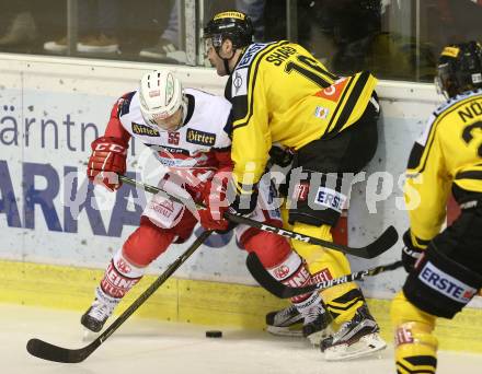 EBEL. Eishockey Bundesliga. KAC gegen 	UPC Vienna Capitals. Mitja Robar,  (KAC), MacGregor Sharp (Vienna). Klagenfurt, am 6.10.2016.
Foto: Kuess

---
pressefotos, pressefotografie, kuess, qs, qspictures, sport, bild, bilder, bilddatenbank