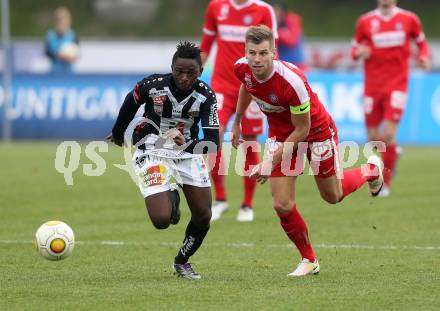 Fussball Bundesliga. RZ Pellets WAC gegen FK Austria Wien. Zakaria Sanogo,  (WAC), Alexander Gruenwald (Austria Wien). Wolfsberg, am 27.11.2016.
Foto: Kuess

---
pressefotos, pressefotografie, kuess, qs, qspictures, sport, bild, bilder, bilddatenbank