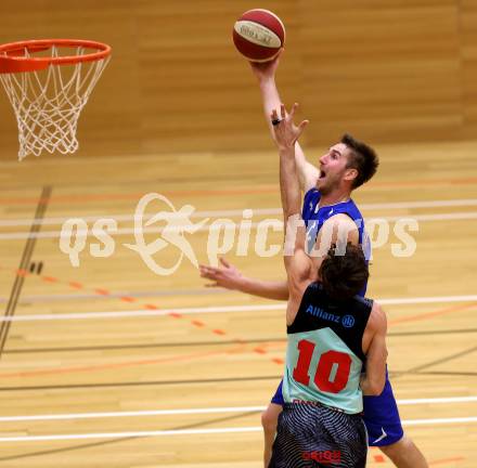 Basketball 2. Bundesliga. GD 9. Runde. Raiders Villach gegen D.C. Timberwolves. Simon Finzgar (Villach), Nemanja NIKOLIC (D.C. Timberwolves). Villach, am 4.12.2016.
Foto: Kuess
---
pressefotos, pressefotografie, kuess, qs, qspictures, sport, bild, bilder, bilddatenbank