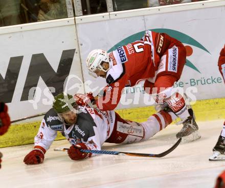 EBEL. Eishockey Bundesliga. KAC gegen 	HCB Suedtirol Alperia. Steven Strong, (KAC), Travis Oleksuk  (Bozen). Klagenfurt, am 16.12.2016.
Foto: Kuess

---
pressefotos, pressefotografie, kuess, qs, qspictures, sport, bild, bilder, bilddatenbank