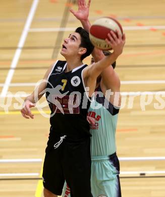 Basketball 2. Bundesliga. GD11. Runde. Raiders Villach gegen Woerthersee Piraten. Julian Hartl,  (Villach), Volkan Oezdemir (Woerthersee Piraten). Villach, am 17.12.2016.
Foto: Kuess
---
pressefotos, pressefotografie, kuess, qs, qspictures, sport, bild, bilder, bilddatenbank