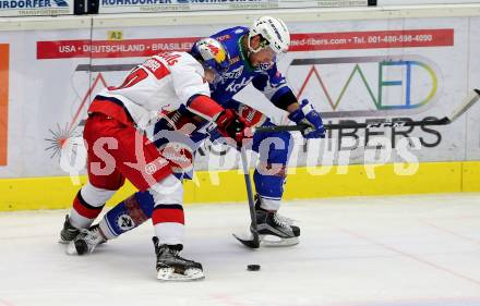 EBEL. Eishockey Bundesliga. VSV gegen	EC Red Bull Salzburg	. Jan Urbas,  (VSV), Raphael Herburger (Salzburg). Villach, am 20.12.2016.
Foto: Kuess

---
pressefotos, pressefotografie, kuess, qs, qspictures, sport, bild, bilder, bilddatenbank