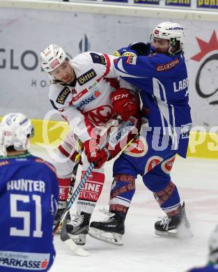 EBEL. Eishockey Bundesliga. VSV gegen	KAC. Samuel Labrecque,  (VSV), Mark Hurturbise (KAC). Villach, am 28.12.2016.
Foto: Kuess

---
pressefotos, pressefotografie, kuess, qs, qspictures, sport, bild, bilder, bilddatenbank