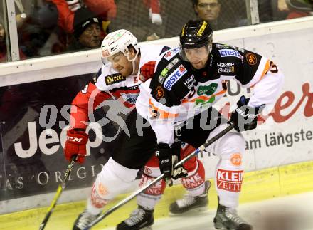 EBEL. Eishockey Bundesliga. KAC gegen 	Moser Medical Graz99ers. Matthew Neal,  (KAC), Matthew Pelech (Graz). Klagenfurt, am 6.1.2017.
Foto: Kuess

---
pressefotos, pressefotografie, kuess, qs, qspictures, sport, bild, bilder, bilddatenbank