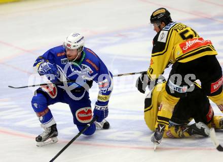 EBEL. Eishockey Bundesliga. VSV gegen	UPC Vienna Capitals. Markus Schlacher,  (VSV), Mario Fischer (Vienna Capitals). Villach, am 6.1.2017.
Foto: Kuess

---
pressefotos, pressefotografie, kuess, qs, qspictures, sport, bild, bilder, bilddatenbank