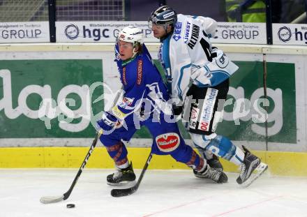 EBEL. Eishockey Bundesliga. VSV gegen	EHC Liwest Black Wings Linz.  Christof Kromp,  (VSV), Mario Altmann (Linz). Villach, am 11.1.2017.
Foto: Kuess

---
pressefotos, pressefotografie, kuess, qs, qspictures, sport, bild, bilder, bilddatenbank