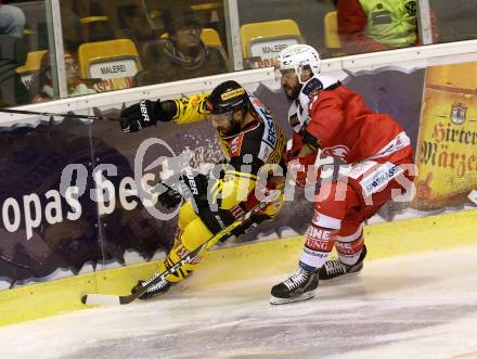 EBEL. Eishockey Bundesliga. KAC gegen 	UPC Vienna Capitals. David Fischer,  (KAC), Jerry Pollastrone (Vienna Capitals). Klagenfurt, am 11.1.2017.
Foto: Kuess

---
pressefotos, pressefotografie, kuess, qs, qspictures, sport, bild, bilder, bilddatenbank