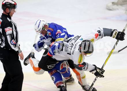 EBEL. Eishockey Bundesliga. VSV gegen	Dornbirner Eishockey Club. Dustin Johner, (VSV), James Livingston (Dornbirn). Villach, am 27.1.2017.
Foto: Kuess

---
pressefotos, pressefotografie, kuess, qs, qspictures, sport, bild, bilder, bilddatenbank