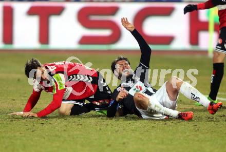 Fussball Bundesliga. RZ Pellets WAC gegen SV Guntamatic Ried. Nemanja Rnic, (WAC), Dieter Elsneg (Ried). Wolfsberg, am 11.2.2017.
Foto: Kuess

---
pressefotos, pressefotografie, kuess, qs, qspictures, sport, bild, bilder, bilddatenbank