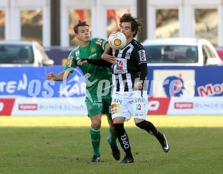 Fussball Bundesliga. RZ Pellets WAC gegen SK Rapid Wien. Thomas Zuendel,  (WAC), Stefan Schwab (Rapid). Wolfsberg, am 11.2.2017.
Foto: Kuess

---
pressefotos, pressefotografie, kuess, qs, qspictures, sport, bild, bilder, bilddatenbank