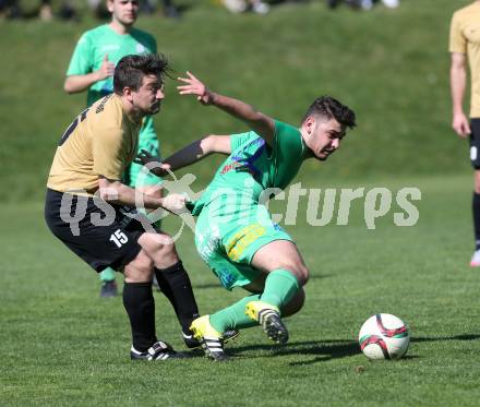 Fussball. Kaerntner Liga. Koettmannsdorf gegen Lendorf.Christian Sablatnig (Koettmannsdorf), Atakurt Fidanci (Lendorf). Koettmannsdorf, 9.4.2017.
Foto: Kuess
---
pressefotos, pressefotografie, kuess, qs, qspictures, sport, bild, bilder, bilddatenbank