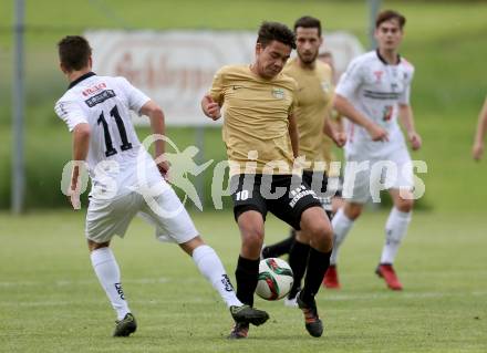 Fussball Kaerntner Liga. Koettmannsdorf gegen WAC Amateure. Dominik Kruschitz,  (Koettmannsdorf), Alexander Ranacher (WAC). Koettmannsdorf, am 4.6.2017.
Foto: Kuess
---
pressefotos, pressefotografie, kuess, qs, qspictures, sport, bild, bilder, bilddatenbank