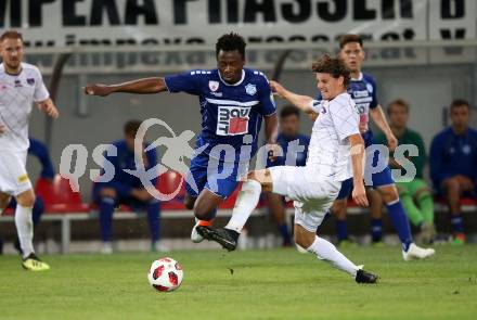 Fussball 2. Liga. SK Austria Klagenfurt gegen SC Wiener Neustadt. Patrick Greil,  (Austria Klagenfurt),  Michael Cheukoua (Wiener Neustadt). Klagenfurt, am 23.9.2018.
Foto: Kuess
---
pressefotos, pressefotografie, kuess, qs, qspictures, sport, bild, bilder, bilddatenbank