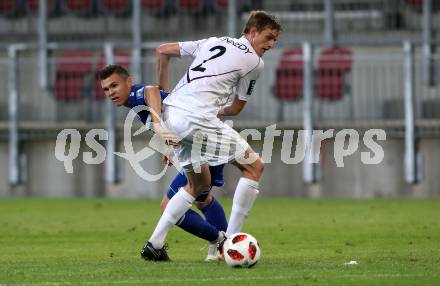 Fussball 2. Liga. SK Austria Klagenfurt gegen SC Wiener Neustadt. Scott Fitzgerald Kennedy,  (Austria Klagenfurt),  David Harrer (Wiener Neustadt). Klagenfurt, am 23.9.2018.
Foto: Kuess
---
pressefotos, pressefotografie, kuess, qs, qspictures, sport, bild, bilder, bilddatenbank