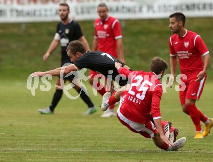 Fussball Kaerntner Liga. ASKOE Koettmannsdorf gegen Atus Ferlach. Martin Trattnig (Koettmannsdorf), Daniel Jobst (Ferlach). Koettmannsdorf, am 22.9.2018.
Foto: Kuess
---
pressefotos, pressefotografie, kuess, qs, qspictures, sport, bild, bilder, bilddatenbank