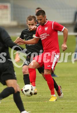 Fussball Kaerntner Liga. ASKOE Koettmannsdorf gegen Atus Ferlach. Martin Trattnig (Koettmannsdorf), Abian Jose Serrano Davila (Ferlach). Koettmannsdorf, am 22.9.2018.
Foto: Kuess
---
pressefotos, pressefotografie, kuess, qs, qspictures, sport, bild, bilder, bilddatenbank