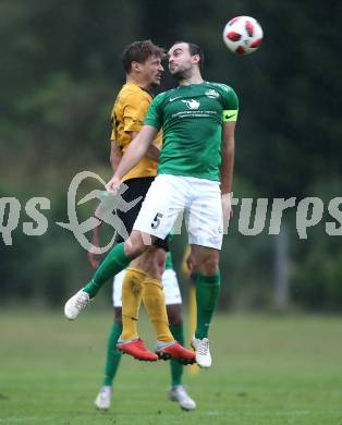 Fussball Unterliga Ost. Grafenstein gegen Donau.  Fabian Stornig (Grafenstein), Alexander Percher (Donau). Grafenstein, am 22.9.2018.
Foto: Kuess
---
pressefotos, pressefotografie, kuess, qs, qspictures, sport, bild, bilder, bilddatenbank