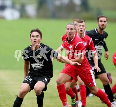 Fussball Kaerntner Liga. ASKOE Koettmannsdorf gegen Atus Ferlach. Philipp Gatti (Koettmannsdorf), Thomas Ogris (Ferlach). Koettmannsdorf, am 22.9.2018.
Foto: Kuess
---
pressefotos, pressefotografie, kuess, qs, qspictures, sport, bild, bilder, bilddatenbank