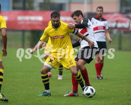 Fussball. Unterliga West. Nussdorf gegen Fuernitz. David Oberhuber (Nussdorf), Elvis Sahinovic  (Fuernitz). Nussdorf, 27.10.2018.
Foto: Kuess
---
pressefotos, pressefotografie, kuess, qs, qspictures, sport, bild, bilder, bilddatenbank